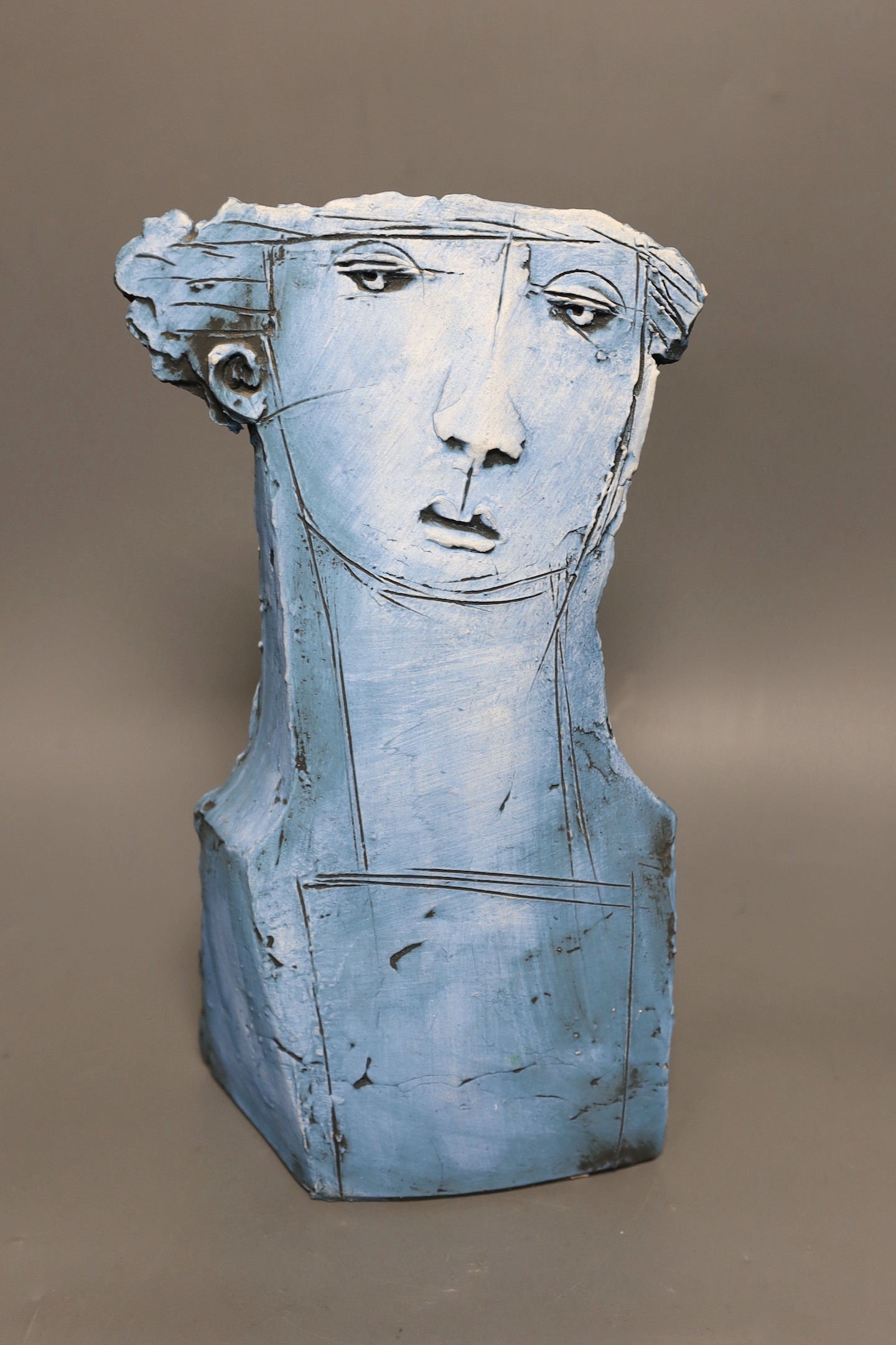 Christy Keeney (b.1958), a signed pottery bust, 33cms high